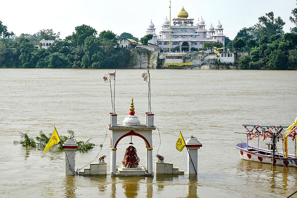 Weather: Temple remains submerged in Jabalpur