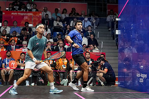 India’s Abhay Singh, right, competes against Malaysia’s Eain Yow Ng during the men's singles final Squash match in the ongoing 20th Asian Games, in Nagoya, Japan.