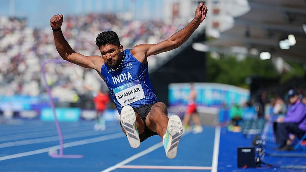 India's Tejaswin Shankar competes in the men's decathlon long jump at the Commonwealth Games in Glasgow, Scotland, Thursday, July 30, 2026.  - | Photo: AP/Alastair Grant