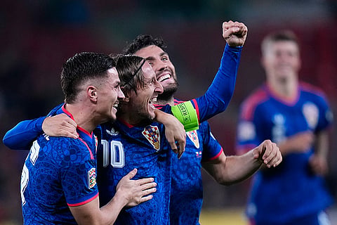 Croatia's Luka Modric, 2nd left, celebrates after scoring the opening goal during the Nations League soccer match between Czechia and Croatia in Prague.