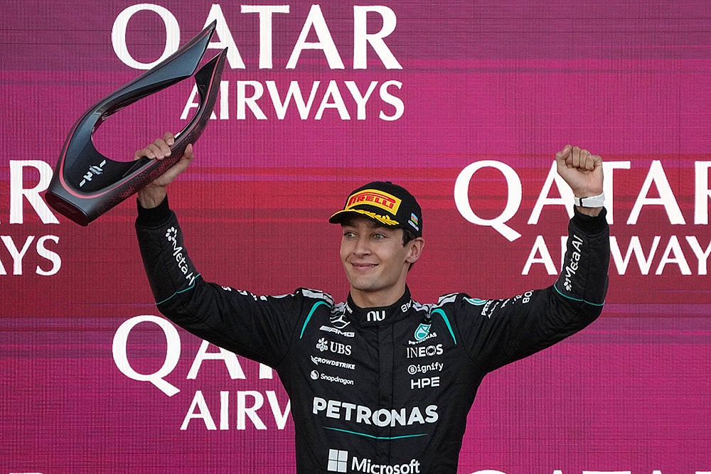 Mercedes driver George Russell of Britain celebrates after winning the Azerbaijan F1 Grand Prix auto race, in Baku, Azerbaijan, Saturday, Sept. 26, 2026. - | Photo: AP/Darko Bandic
