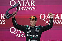 | Photo: AP/Darko Bandic : Mercedes driver George Russell of Britain celebrates after winning the Azerbaijan F1 Grand Prix auto race, in Baku, Azerbaijan, Saturday, Sept. 26, 2026.