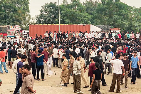 Students of Lovely Professional University (LPU) stage a protest and block the Jalandhar-Phagwara National Highway outside the campus over claims that a female student was raped by an outsider in the university premises, near Phagwara, Punjab.