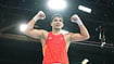 Photo: AP/Eranga Jayawardena : India's Ankush Panghal celebrates after winning the men's 80kg boxing final at the Commonwealth Games in Glasgow, Scotland.
