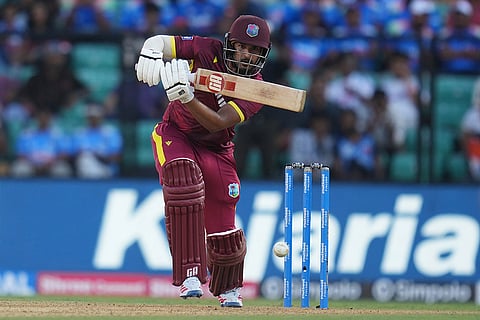 West Indies' Amir Jangoo plays a shot during the first one day international cricket match between India and West Indies in Thiruvananthapuram, India.