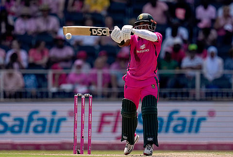 South Africa's captain Temba Bavuma plays a high ball during the second one day international cricket match between South Africa and Australia, in Johannesburg, South Africa, Sunday, Sept. 27, 2026. 