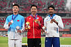 Asian Games 2026: Tejaswin Shankar Wins Bronze in Thrilling Decathlon Showdown | Photo: AP/Mark Baker : Gold medalist Japan's Yuma Maruyama, center, flanked by silver medalist China's Chen Xinghua left, and bronze medalist India's Tejaswin Shankar, right, pose on the podium during the medal ceremony in the decathlon 1500m at the Asian Games in Nagoya, Japan, Sunday, Sept. 27, 2026.