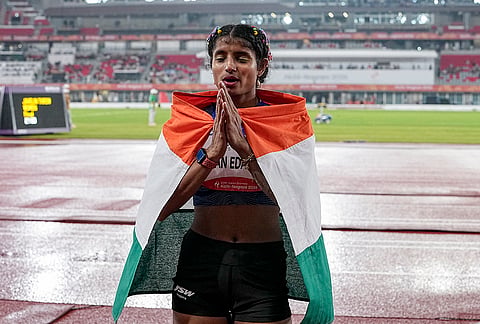India's Ancy Sojan celebrates after winning silver medal in the women's long jump final event at the ongoing 20th Asian Games, in Nagoya, Japan, Sunday, Sept. 27, 2026. 