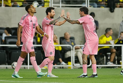 Inter Miami's Lionel Messi, center, celebrates with teammate Rodrigo De Paul, right, after scoring against the Columbus Crew during the first half of an MLS soccer match, Sunday, Sept. 27, 2026, in Columbus, Ohio. 