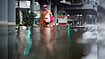 Thailand Floods Kill 8 Since September 16, Over 1.7 Million People Affected Reuters : A woman carrying groceries navigate through a flooded area near a market in Bangkok