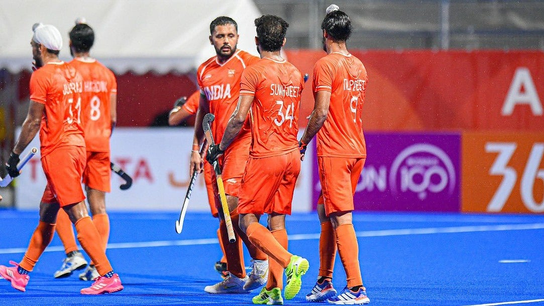 Defending champions India thrashed Bangladesh 10-0 in heavy rain to finish top of Pool A with a +45 goal difference. - TheHockeyIndia/X