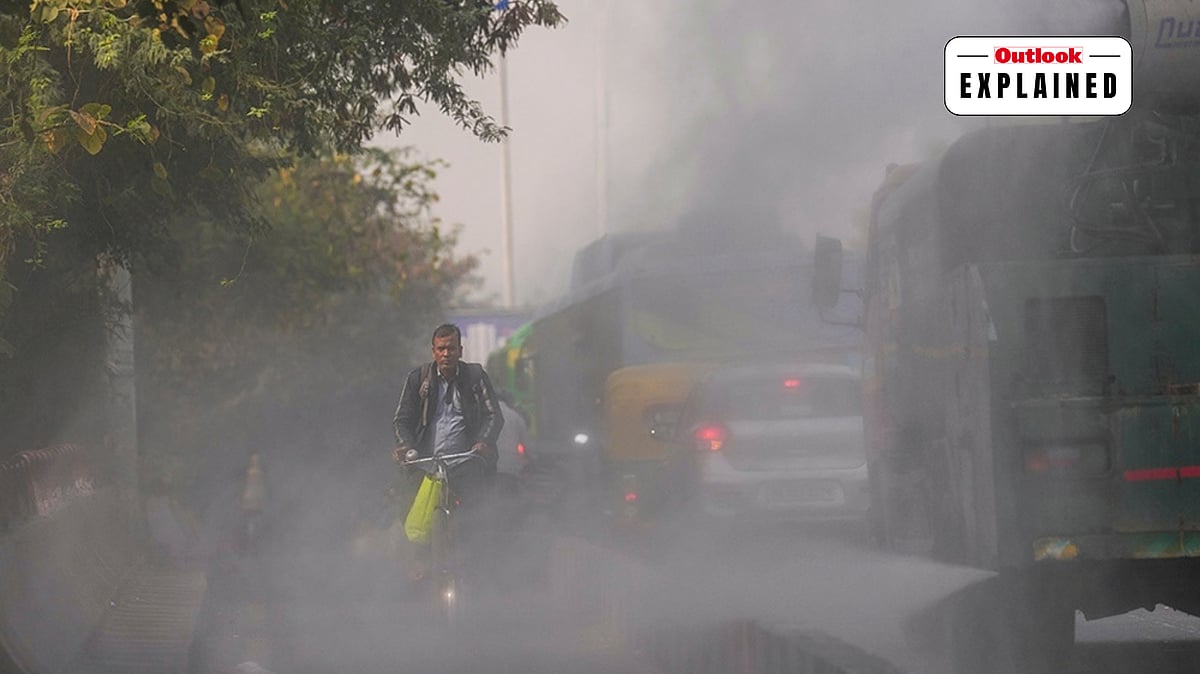 An anti-smog gun sprays water droplets to curb air pollution, in New Delhi. - | Photo: PTI/Karma Bhutia