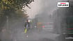 | Photo: PTI/Karma Bhutia : An anti-smog gun sprays water droplets to curb air pollution, in New Delhi.