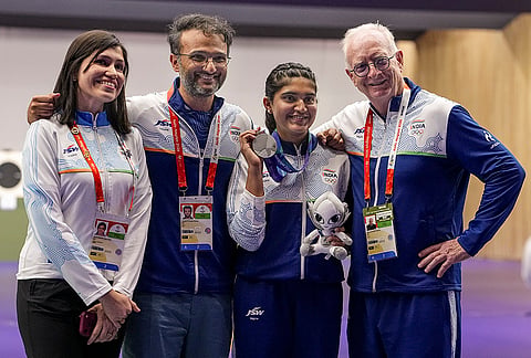 India's Esha Singh poses with her silver medal won in the women's 25m pistol event during the ongoing 20th Asian Games, in Nagoya, Japan, Monday, Sept. 28, 2026. 