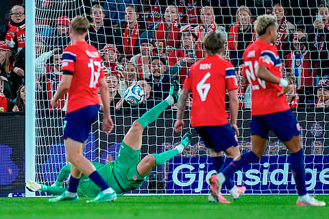 Norway's goalkeeper Ørjan Nyland fails to stop a goal by Portugal's João Félix during a Nations League soccer match between between Norway and Portugal, in Oslo, Sunday, Sept. 27, 2026.