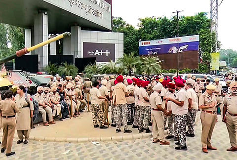 Police personnel stand guard outside the Lovely Professional University (LPU) campus following protests over claims that a female student was raped by an outsider in the university premises, in Phagwara, Kapurthala district, Punjab, Monday, Sept. 28, 2026. 