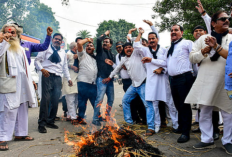 Congress workers burn an effigy during a protest against Chief Election Commissioner (CEC) Gyanesh Kumar, in Prayagraj, Uttar Pradesh, Monday, Sept. 28, 2026. 