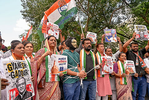 Congress workers stage a protest seeking the resignation of Chief Election Commissioner (CEC) Gyanesh Kumar over alleged irregularities in the Special Intensive Revision (SIR) of electoral rolls and biased functioning of the Election Commission of India, in Rajkot, Gujarat, Monday, Sept. 28, 2026. 