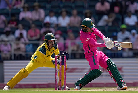 South Africa's batsman Matthew Breetzke, right, plays a shot as Australia's wicketkeeper Alex Carey watches on during the second one day international cricket match between South Africa and Australia, in Johannesburg, South Africa, Sunday, Sept. 27, 2026. 