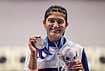 | Photo: PTI/Atul Yadav  : India's Esha Singh poses with her silver medal won in the women's 25m pistol event during the ongoing 20th Asian Games, in Nagoya, Japan, Monday, Sept. 28, 2026. 