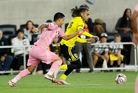 Columbus Crew's Mohamed Farsi, right, keeps the ball away from Inter Miami's Cesar Abadia-Reda, left, during the second half of an MLS soccer match, Sunday, Sept. 27, 2026, in Columbus, Ohio. 