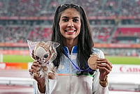 | Photo: PTI/Atul Yadav : Bronze medallist India's Prachi Choudhary poses for photographers during the medal ceremony for the women's 400m final event at the ongoing 20th Asian Games, in Nagoya, Japan, Sunday, Sept. 27, 2026. 