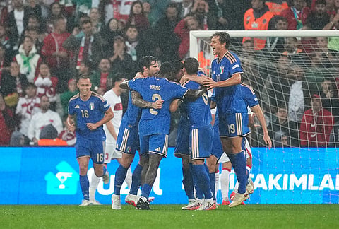 Italy's team players celebrate after Alessandro Bastoni scored the opening goal during the UEFA Nations League soccer match between Turkey and Italy in Bursa, Turkey, Monday, Sept. 28, 2026. 