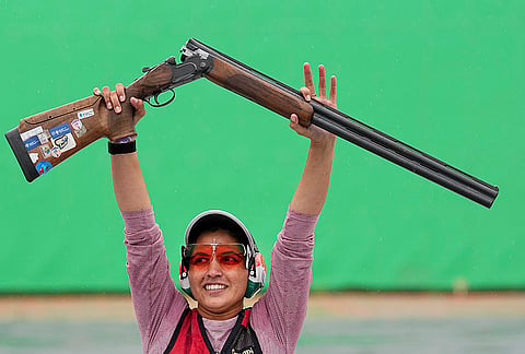 India's Neeru Dhanda celebrates after winning the gold medal in the women's trap shooting individual event during the ongoing 20th Asian Games, in Nagoya, Japan.