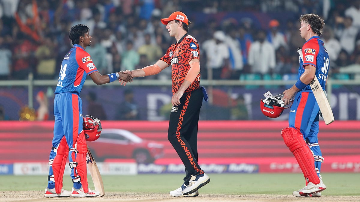 Sunrisers Hyderabad's captain Pat Cummins shakes hands with Delhi Capitals' Tristan Stubbs and Abishek Porel at the end of their Indian Premier League cricket match between Delhi Capitals and Sunrisers Hyderabad at ACA–VDCA Cricket Stadium in Visakhapatnam, India, Sunday, March 30, 2025. 

 - (AP Photo/Surjeet Yadav)

