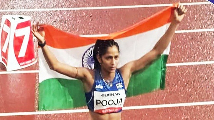 Pooja celebrating after winning bronze in women's high jump at Asian Games 2026 on September 29. - | Photo: X/AFIIndia