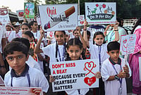 | Photo: PTI : Students hold placards as they participate in a walkathon to mark World Heart Day, in Jammu, Jammu and Kashmir.