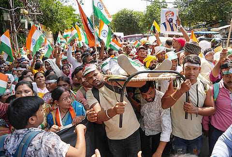 Newly appointed peons march towards the Chief Minister's residence, demanding joining letters, in Patna, Bihar.