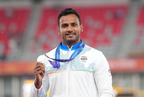 Silver medalist Yashvir Singh of India poses on the podium following the men's javelin throw at the Asian Games in Nagoya, Japan, Tuesday, Sept. 29, 2026. 