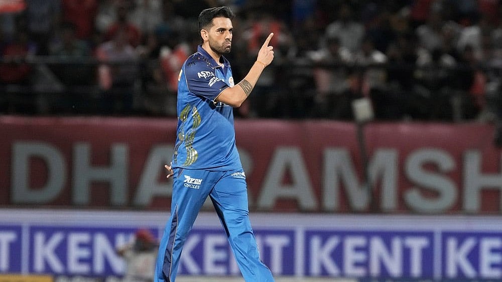 Mumbai Indians' Deepak Chahar celebrates the dismissal of Punjab Kings' Priyansh Arya during the Indian Premier League cricket match between Punjab Kings and Mumbai Indians in Dharamshala, India. - | Photo: AP/Ashwini Bhatia