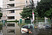Thailand Underwater: Extreme Weather Floods Cities And Communities | Photo: AP/Sakchai Lalit : A man wades through a flooded street after heavy rain in Bangkok, Thailand, Monday, Sept. 28, 2026.