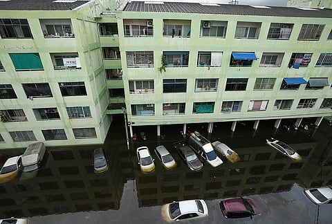 The streets are flooded after a heavy rain, in Bangkok, Thailand, Monday, Sept. 28, 2026. 