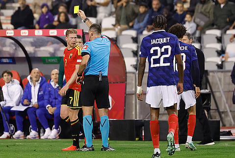 Belgium's Kevin De Bruyne receives a yellow card during the UEFA Nations League soccer match between Belgium and France in Brussels, Belgium, Monday, Sept. 28, 2026. 