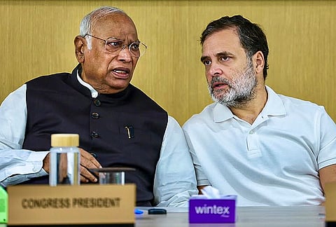 Congress National President and LoP in the Rajya Sabha Mallikarjun Kharge interacts with LoP in the Lok Sabha Rahul Gandhi during the Congress Working Committee (CWC) meeting, in New Delhi. 