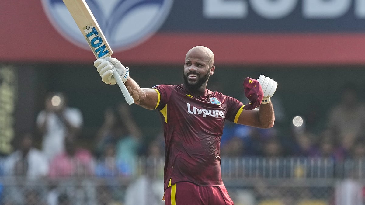 West Indies' John Campbell celebrates his century during the second one-day international cricket match between India and West Indies in Guwahati, India, Wednesday, Sept. 30, 2026 - (AP Photo/ Anupam Nath)