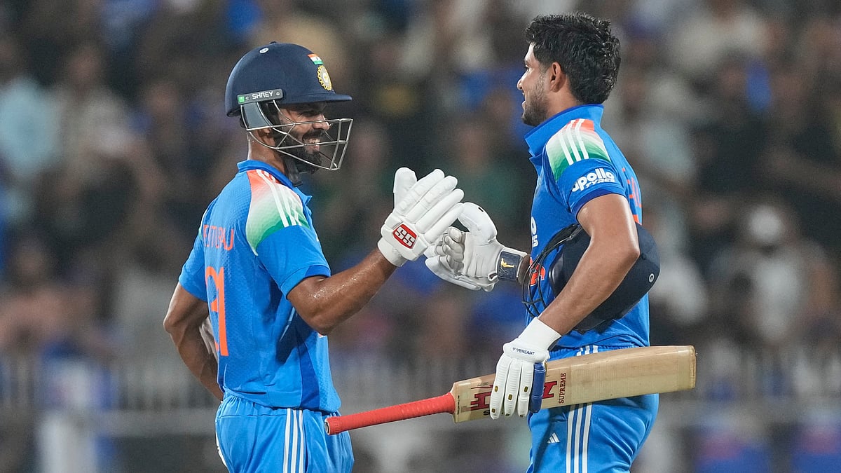 India's captain Shubman Gill, right, celebrates scoring a double century with batting partner Ruturaj Gaikwad during the second one-day international cricket match between India and West Indies in Guwahati, India, Wednesday, Sept. 30, 2026 - (AP Photo/ Anupam Nath)