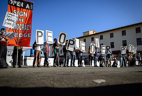 AI protesters chant outside the OpenAI DevDay 2026 conference in San Francisco, Tuesday, Sept 29, 2026. 