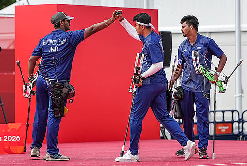 India's Kushal Dalal, Ganesh Mani Ratnam Thirumuru and Sahil Jadhav compete in the compound men's team archery event at the 20th Asian Games, in Nagoya, Japan, Wednesday, Sept. 30, 2026. 