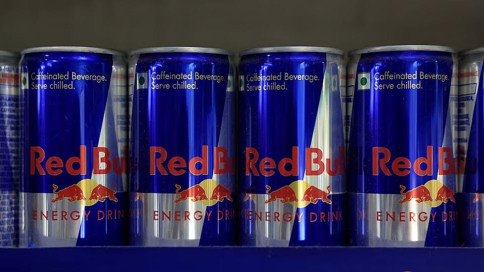Red Bull cans on display for sale  - Reuters
