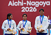 | Photo: AP/Eugene Hoshiko : Gold medalists, India team members celebrate on the podium during the medal ceremony for the compound women's team in archery at the Asian Games in Okazaki, Japan, Wednesday, Sept. 30, 2026. 