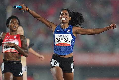 India' s Vithya Ramraj reacts as she crosses the finish line in the women's 4 x 400m relay final at the Asian Games in Nagoya, Japan, Tuesday, Sept. 29, 2026. 
