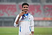 | Photo: AP/Lee Jin-man : Bronze medalist Gulveer Singh of India poses on the podium following the men's 5000-meter final at the Asian Games in Nagoya, Japan, Tuesday, Sept. 29, 2026. 
