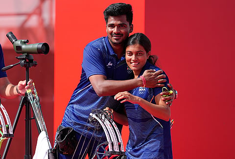 India's Sahil Rajesh Jadhav, left, and Chikitha Taniparthi, right, celebrate after winning over South Korea in the compound mixed team final in archery at the Asian Games in Okazaki, Japan, Wednesday, Sept. 30, 2026. 