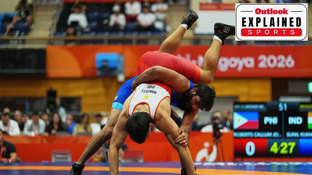 India's Sunil Kumar, right, and Philippines's Callum Johnston Roberts compete in their men's greco-roman 87kg bronze medal wrestling match at the Asian Games in Nagoya, Japan, Wednesday, Sept. 30, 2026. - (AP Photo/Lee Jin-man)