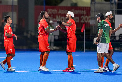 India's captain Harmanpreet Singh, second left, Jugraj Singh, centre, Nilakanta Sharma, left, and others celebrate after winning the men's semifinal hockey match between India and Pakistan, at the ongoing 20th Asian Games, in Kakamigahara, Japan, Thursday, Oct. 1, 2026. 