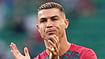 AP Photo/Armando Franca : Portugal's Cristiano Ronaldo, wearing a wedding band, claps his hands during warmup before the Nations League soccer match between Portugal and Wales in Lisbon.